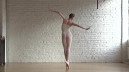 Tiny and flexible ballerina Annett stretching naked