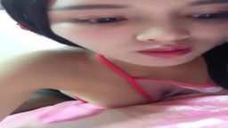 Chinese Cam Girl Masturbates in Traditional Bellyband